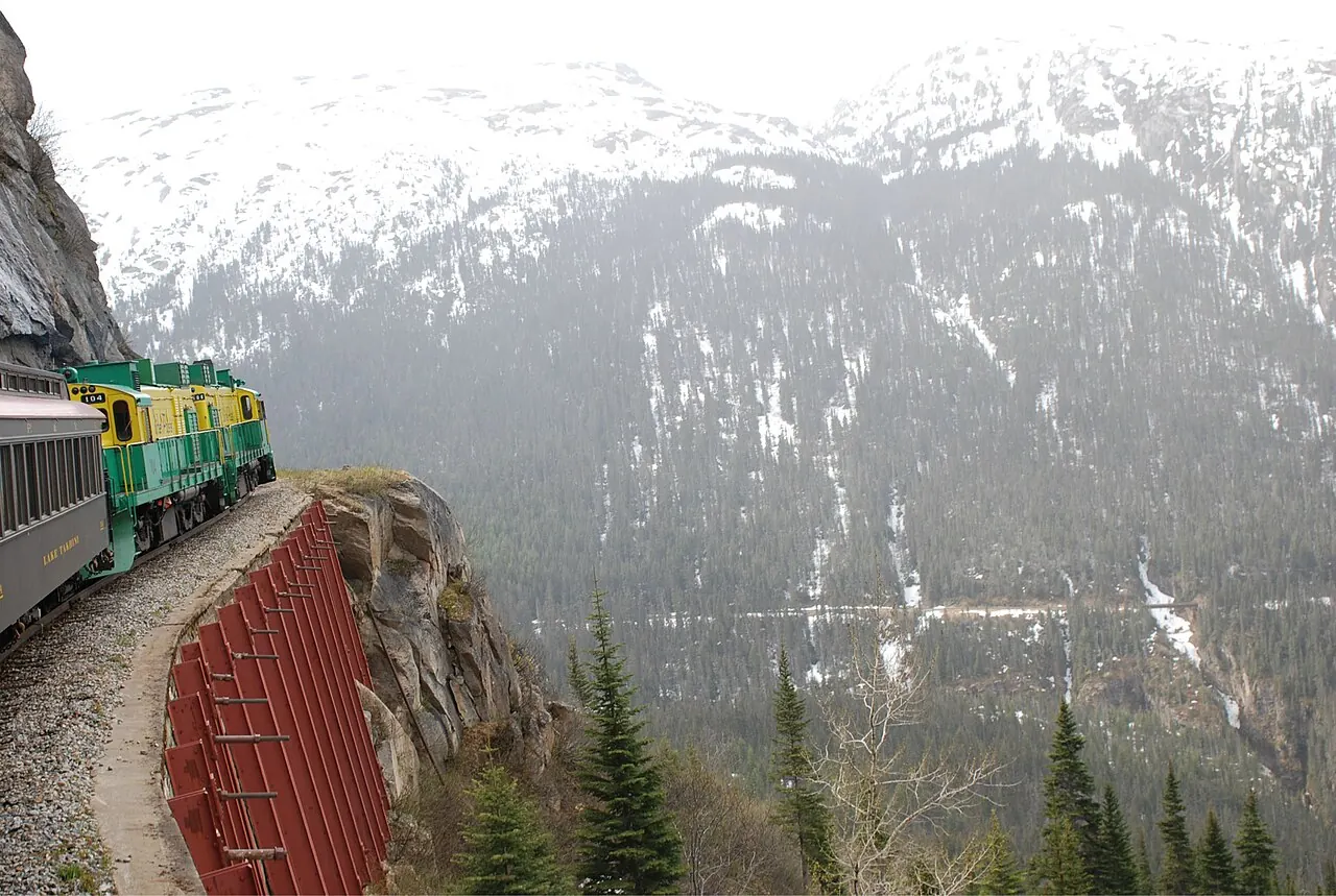 A White Pass and Yukon Route train on the mountainside above Skagway